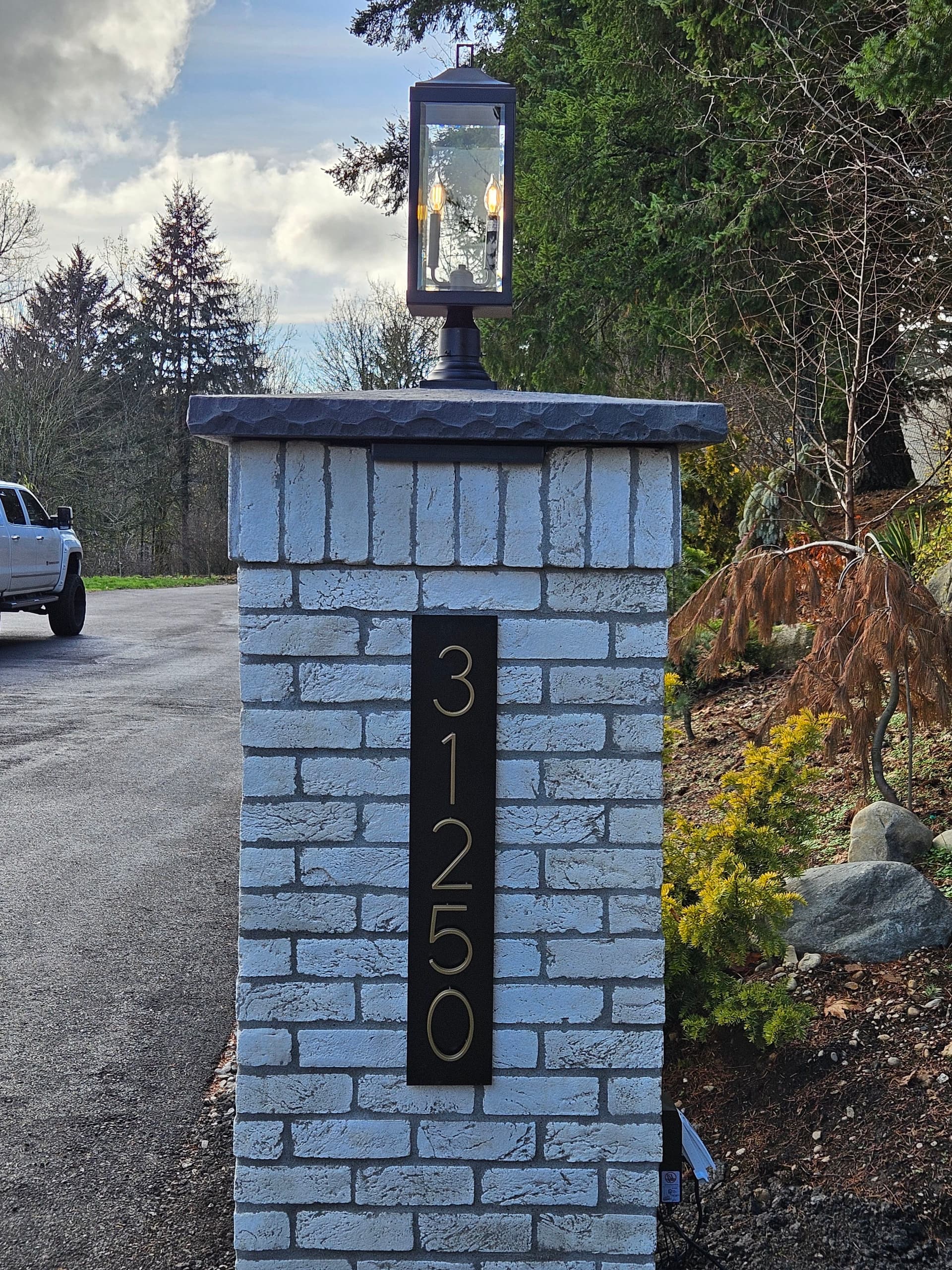 Elegant Pedestal Lighting Installation for Enhanced Curb Appeal