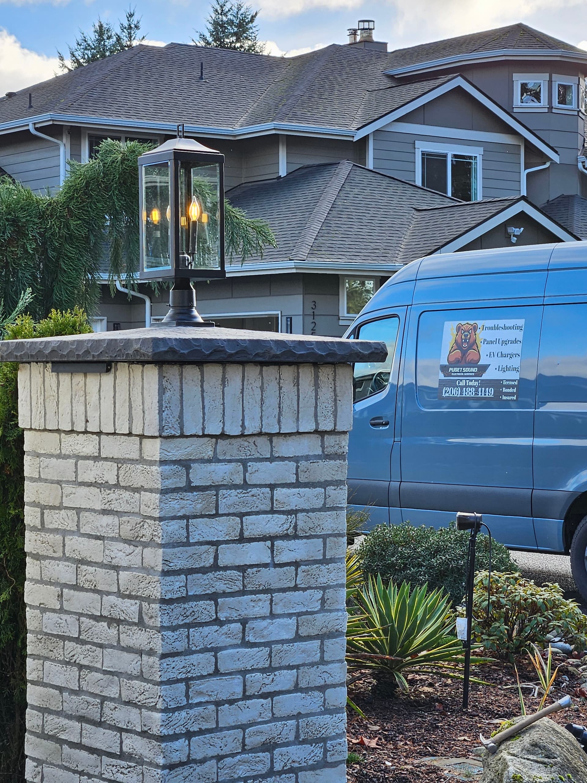 Elegant Pedestal Lighting Installation for Enhanced Curb Appeal